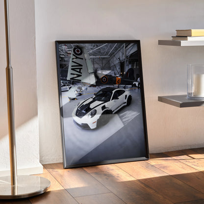 Porsche 911 GT3 RS white sports car poster leaning on floor in modern room wall art.
