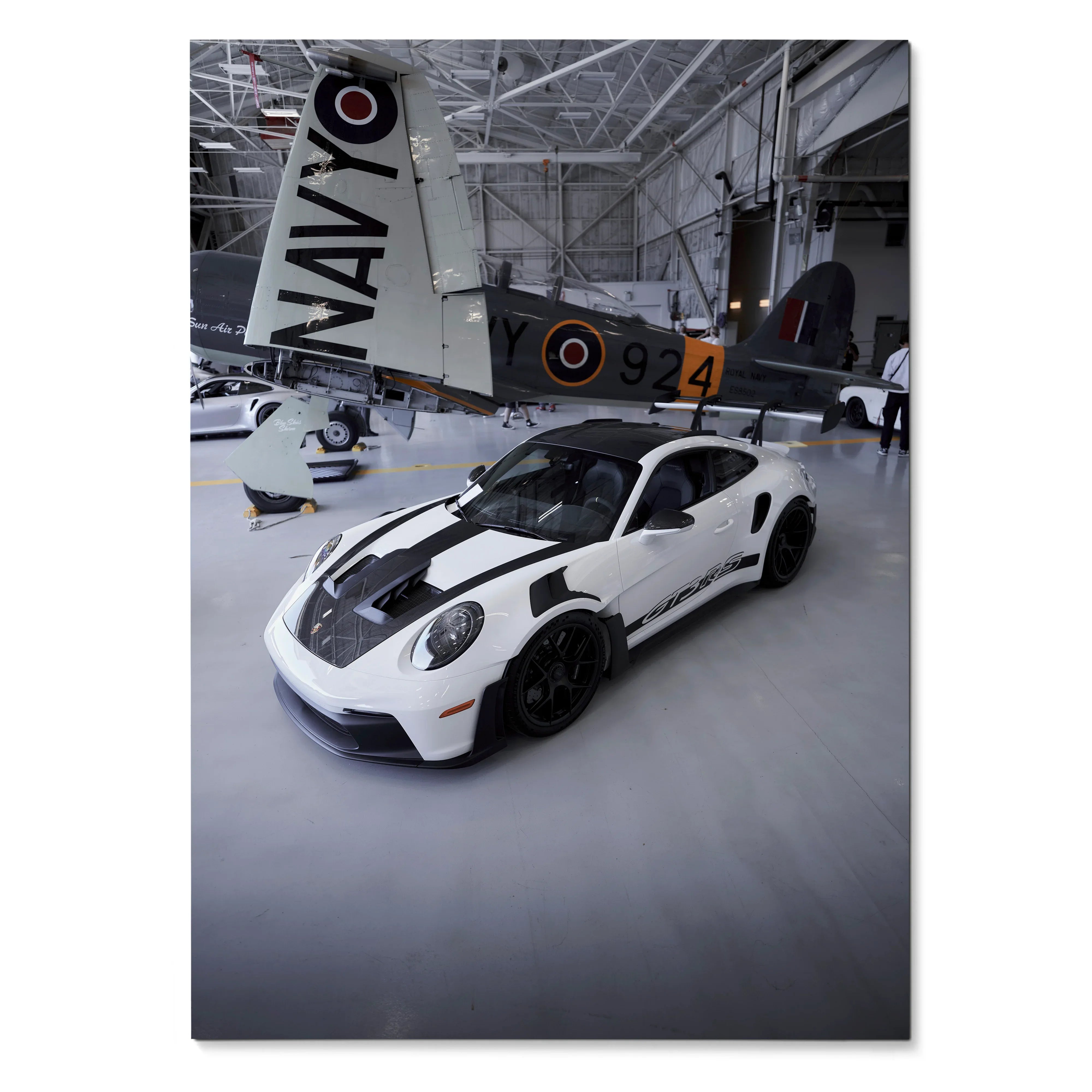 Porsche 911 GT3 RS black and white sports car in hangar wall art poster.