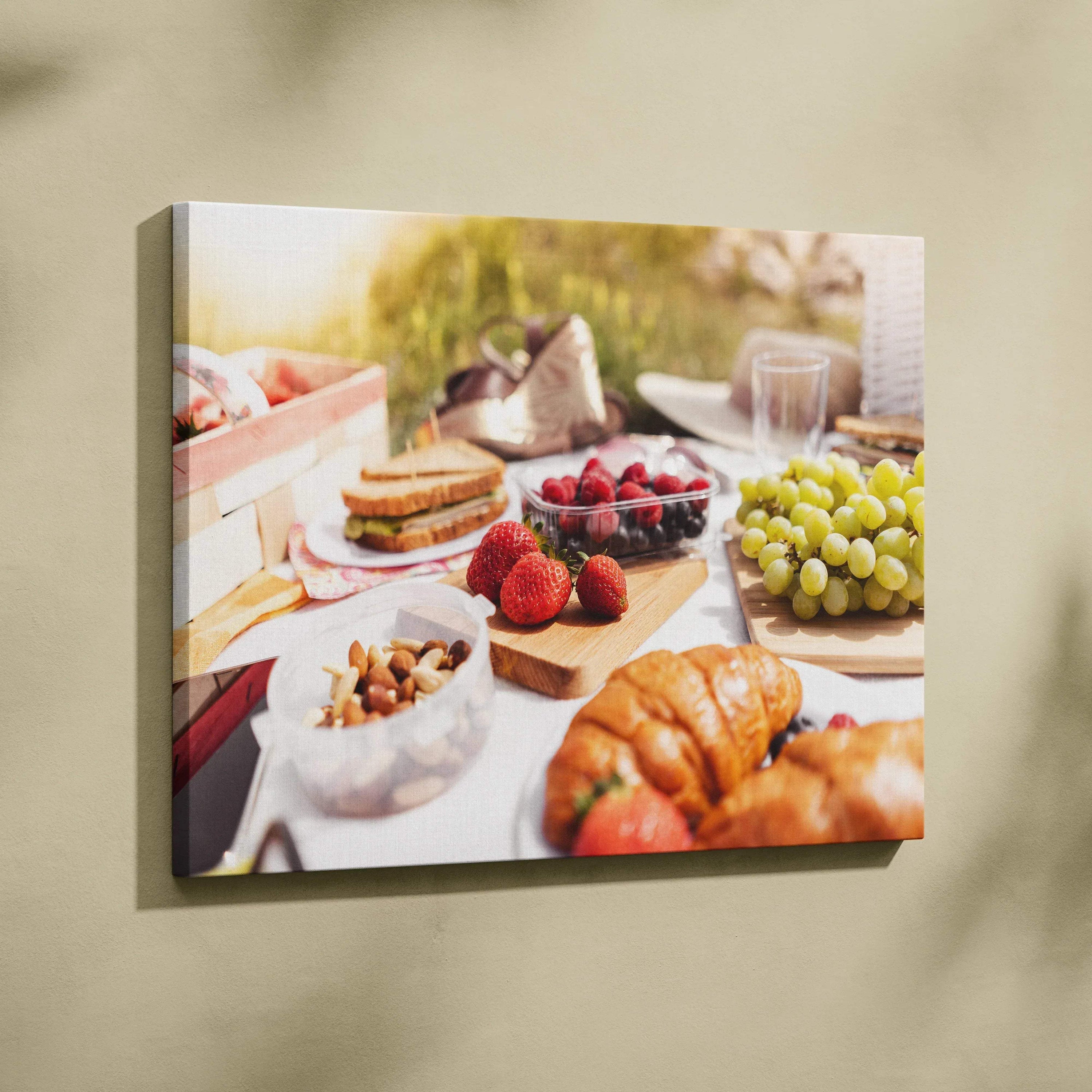 Canvas wall art featuring fresh strawberries, raspberries, green grapes, croissants, and nuts on a lunch table decor.