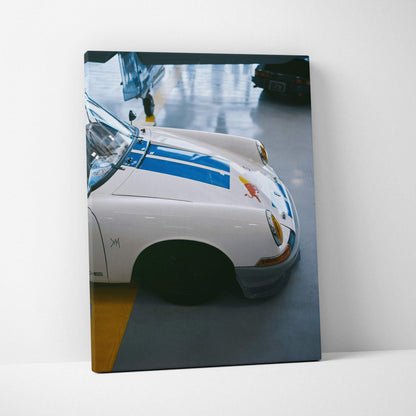 Porsche 911 classic car detailed close-up on vertical canvas wall art with blue racing stripes.