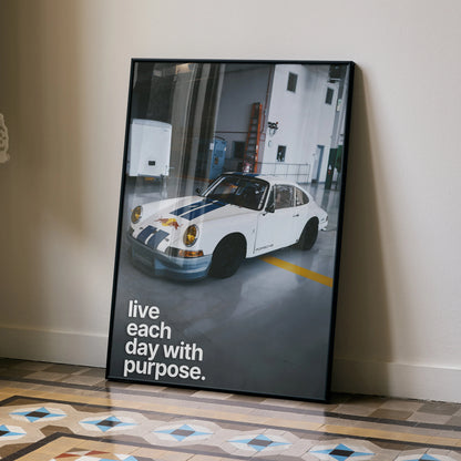 Motivational poster wall art featuring white classic Porsche 911 with "live each day with purpose" text.