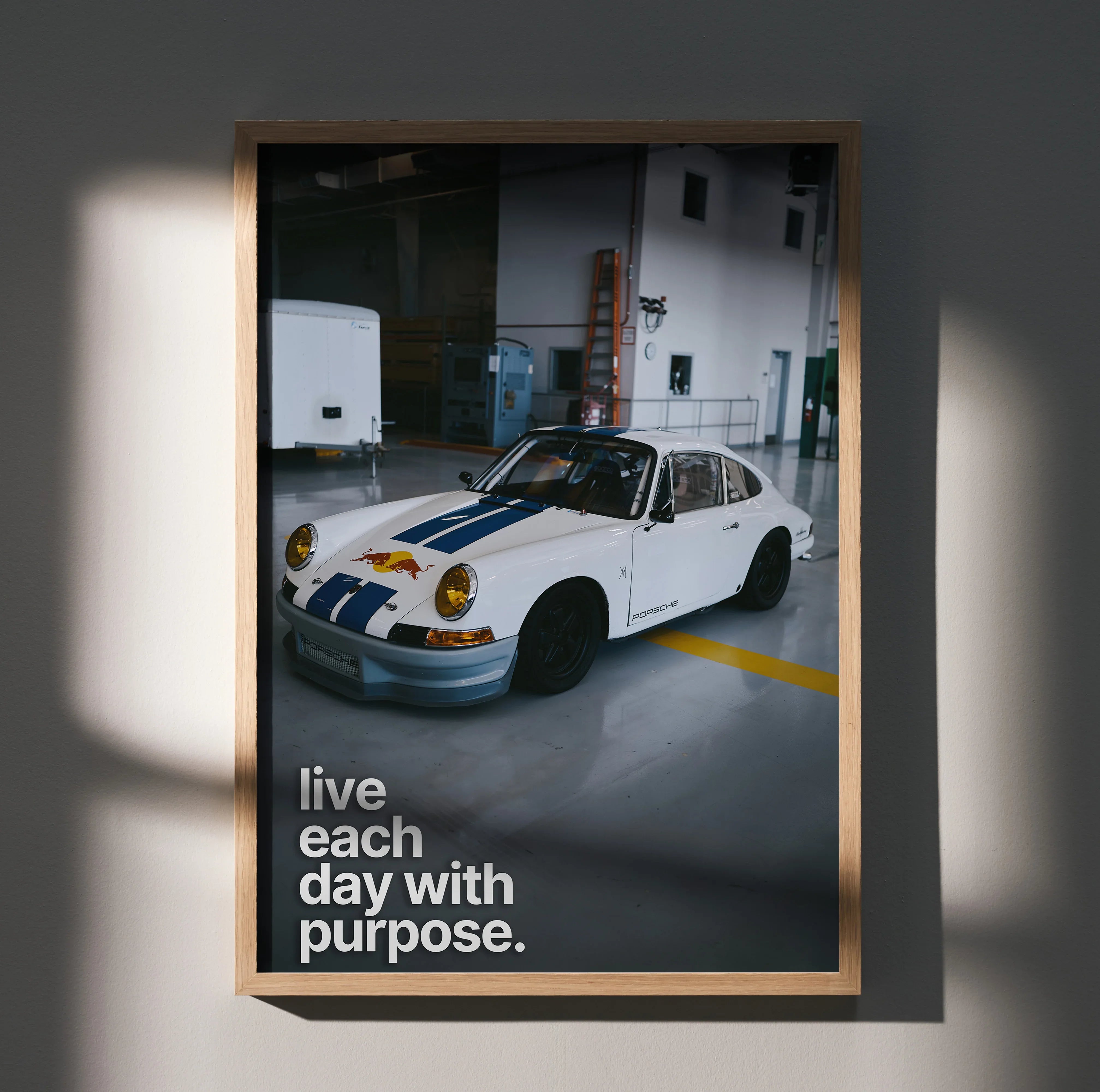 Poster wall art featuring a classic white Porsche 911 with yellow headlights and motivational text.