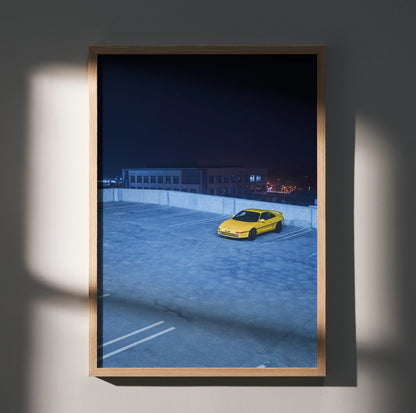 Yellow Toyota MR2 parked on rooftop at night in high resolution poster wall art.