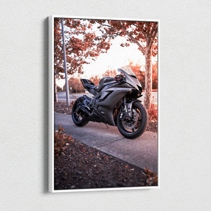 Yamaha R6 motorcycle in black parked on sidewalk autumn scene canvas wall art.