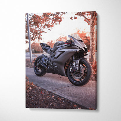 Black Yamaha R6 motorcycle on sidewalk with autumn trees canvas wall art.