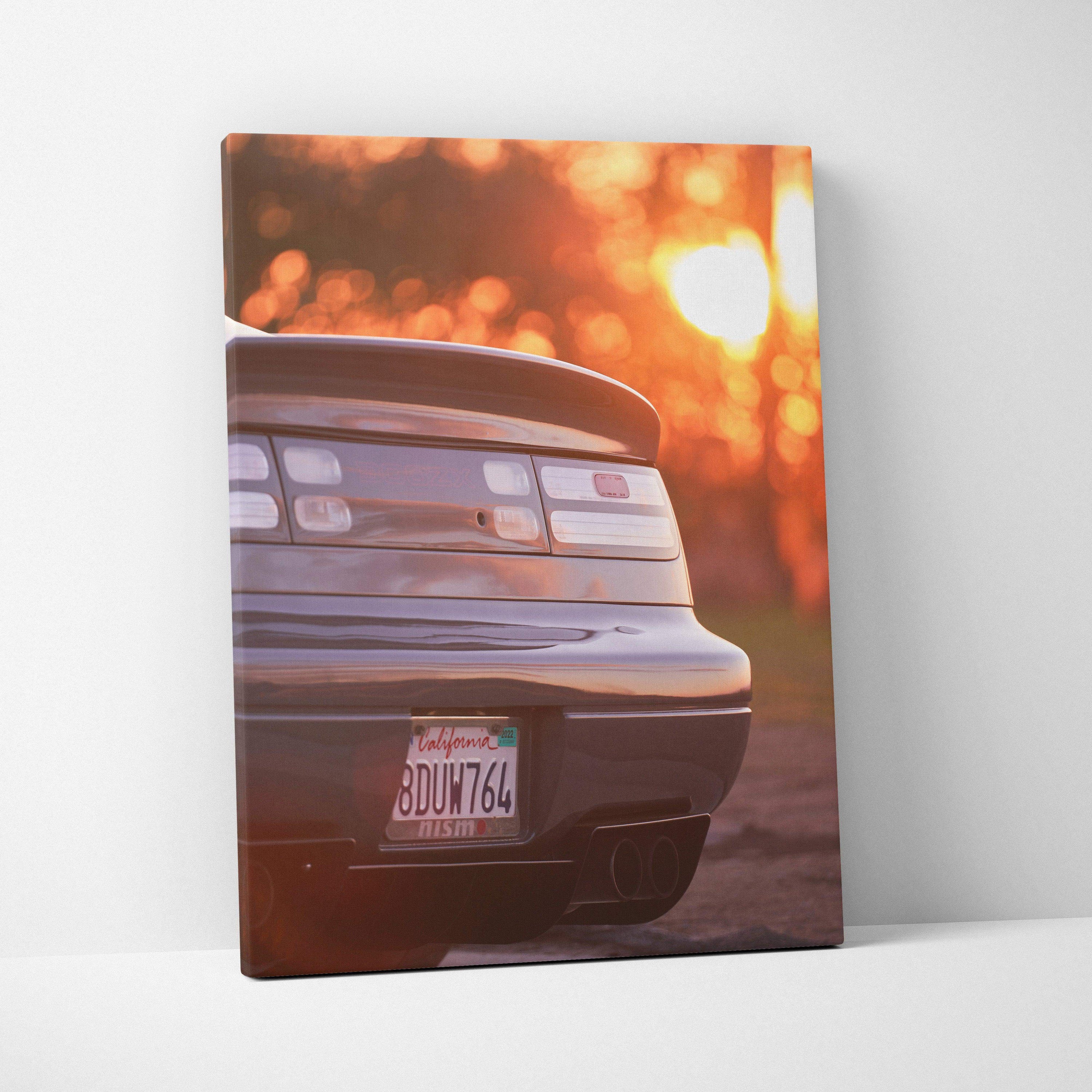 Nissan 300ZX rear view at sunset on vertical canvas wall art with warm orange tones.