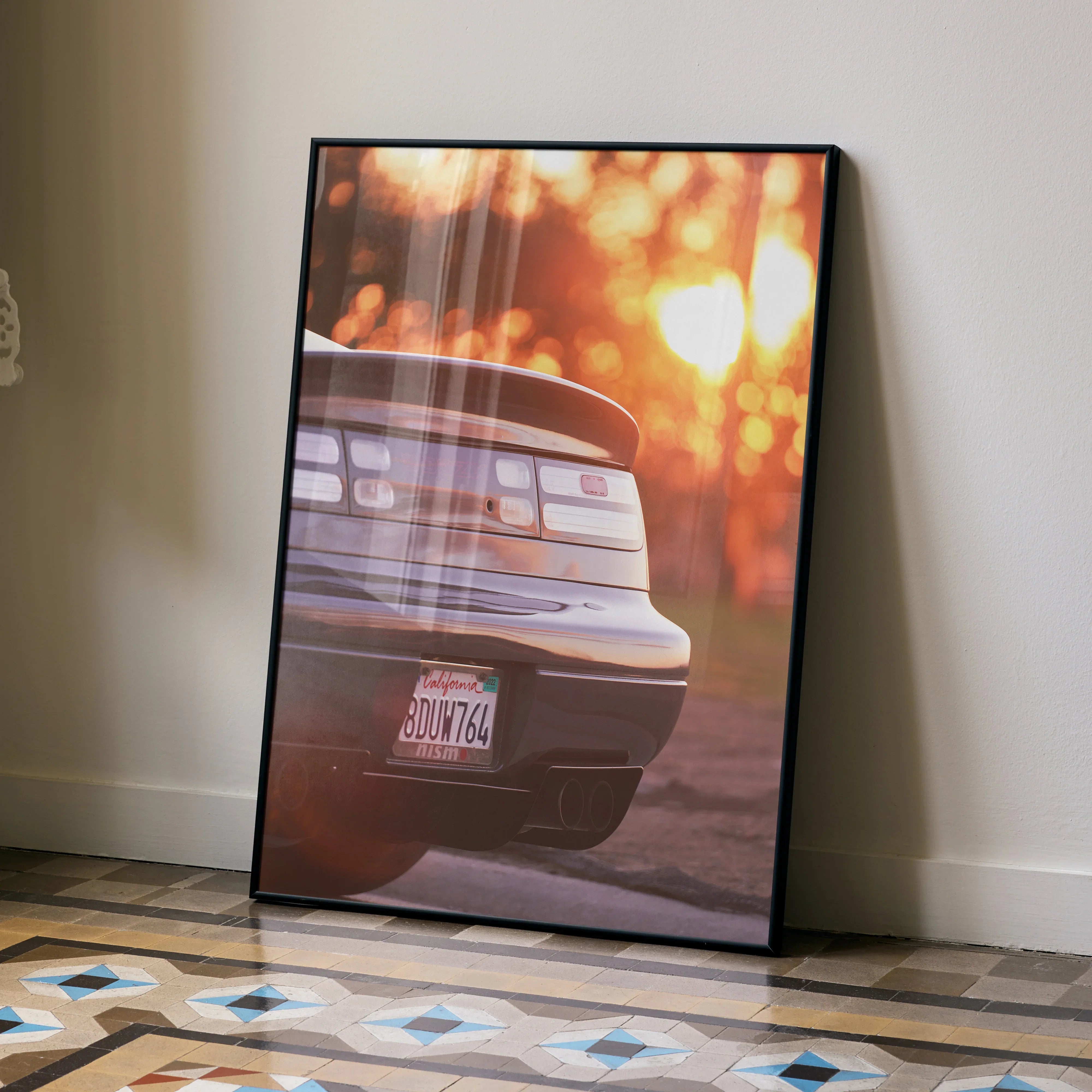 Nissan 300ZX rear view poster with warm sunset tones in sleek black frame wall art.