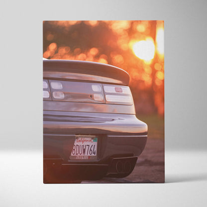 Nissan 300ZX rear view at sunset canvas wall art with warm orange glow and car details visible.