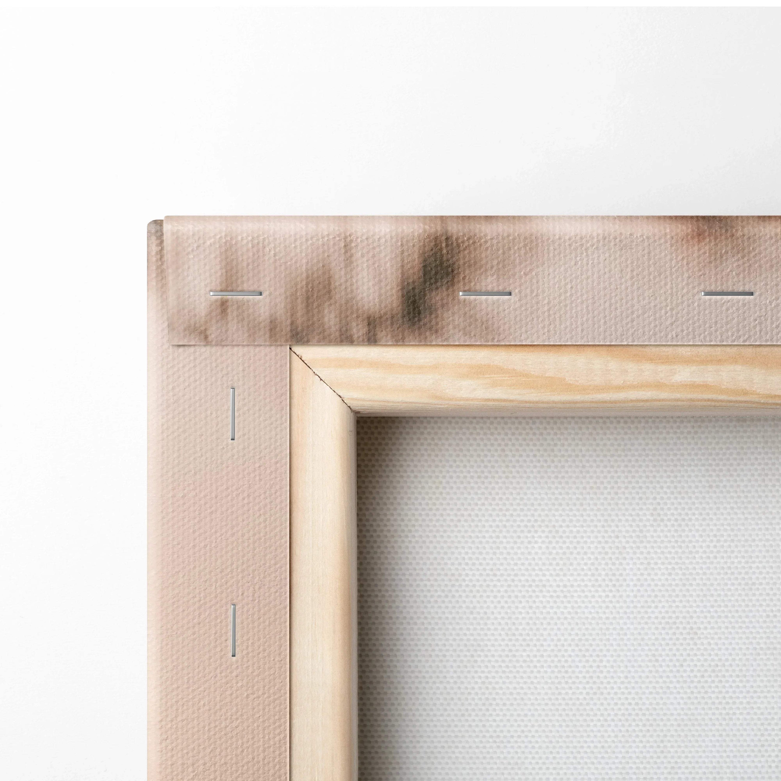 Close-up of stretched canvas art with wooden frame and metal staples on corner, museum-quality wall art canvas.