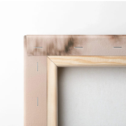 Close-up of stretched canvas art with wooden frame and metal staples on corner, museum-quality wall art canvas.