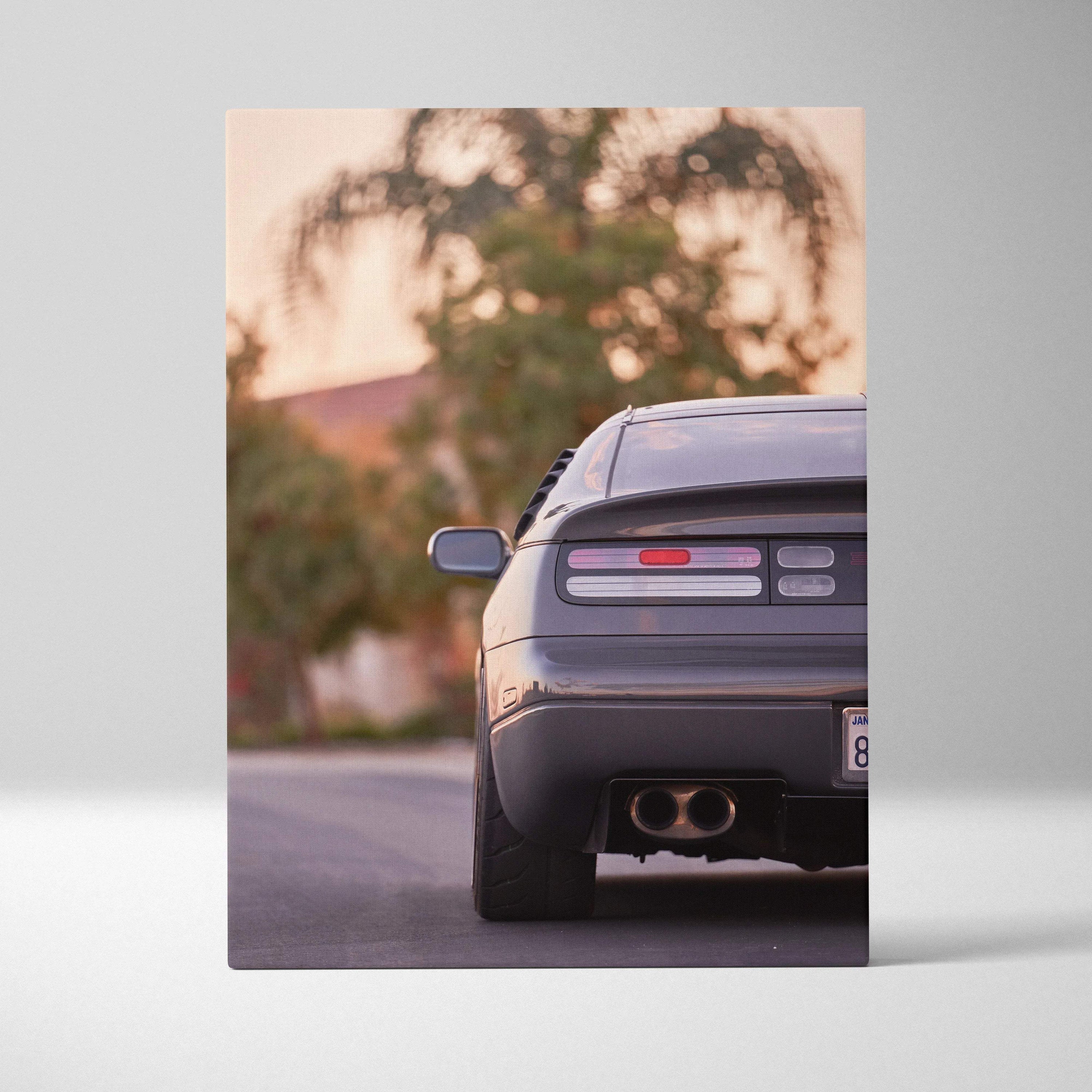 Nissan 300ZX rear view on vertical canvas wall art with muted sunset background.