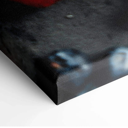 Close-up of vibrant canvas wall art with glossy texture and rich, colorful details on wrapped edges.