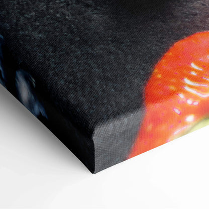 Canvas wall art featuring close-up of vibrant red strawberry popsicles with glossy texture on a dark background.