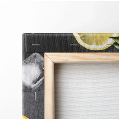 Close-up of wooden frame corner on canvas wall art featuring vibrant lemon slice and mint leaves on dark background.