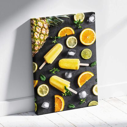 Vibrant lemon and lime popsicles with citrus slices on black background canvas wall art decor.