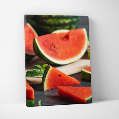 Watermelon canvas wall art featuring vibrant red fruit slices on dark background for modern decor.