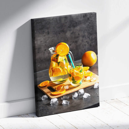 Canvas wall art featuring fresh orange slices in a water glass on a wooden tray with ice cubes, kitchen decor.