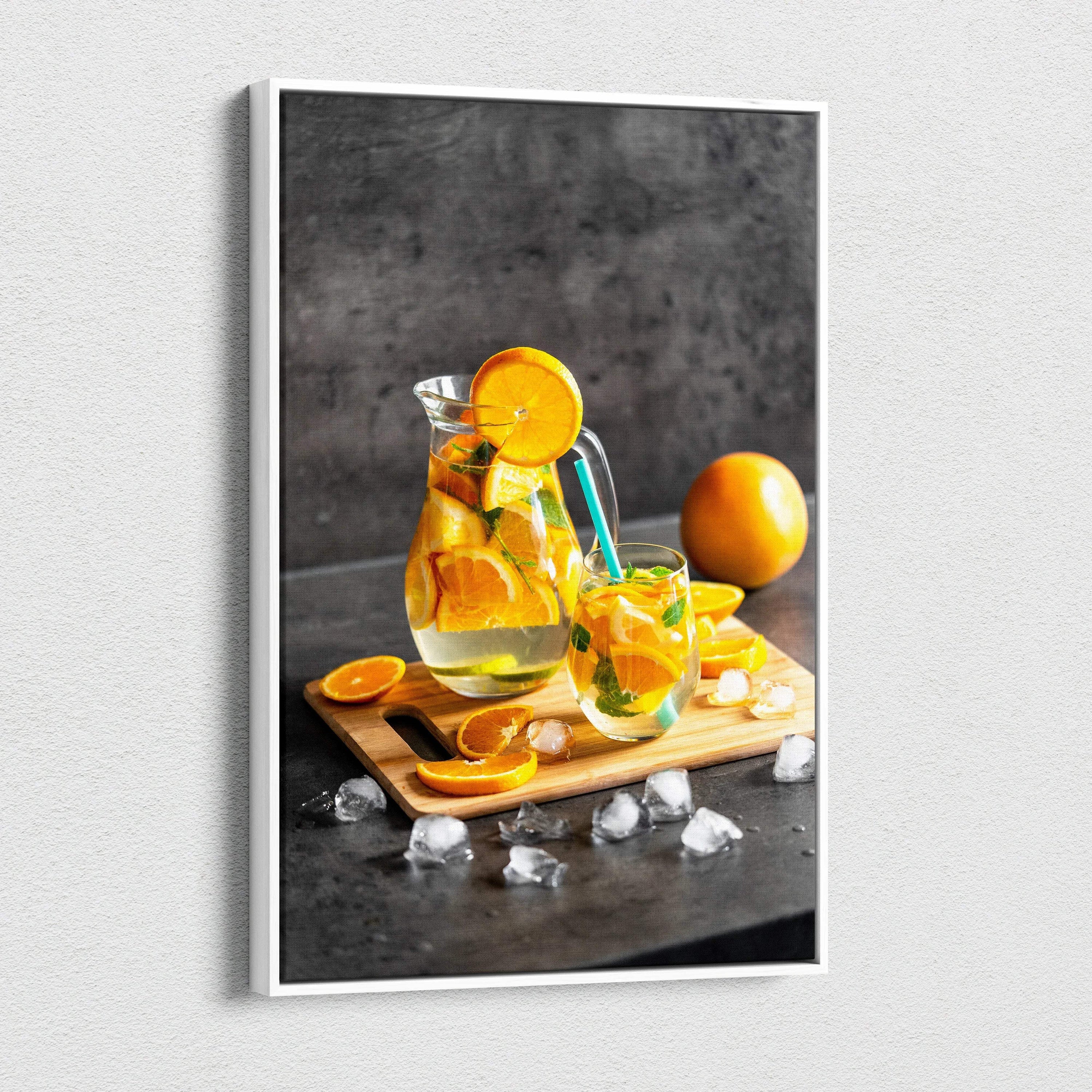 Modern vibrant canvas wall art featuring fresh orange slices in water glass on wooden tray, kitchen decor.