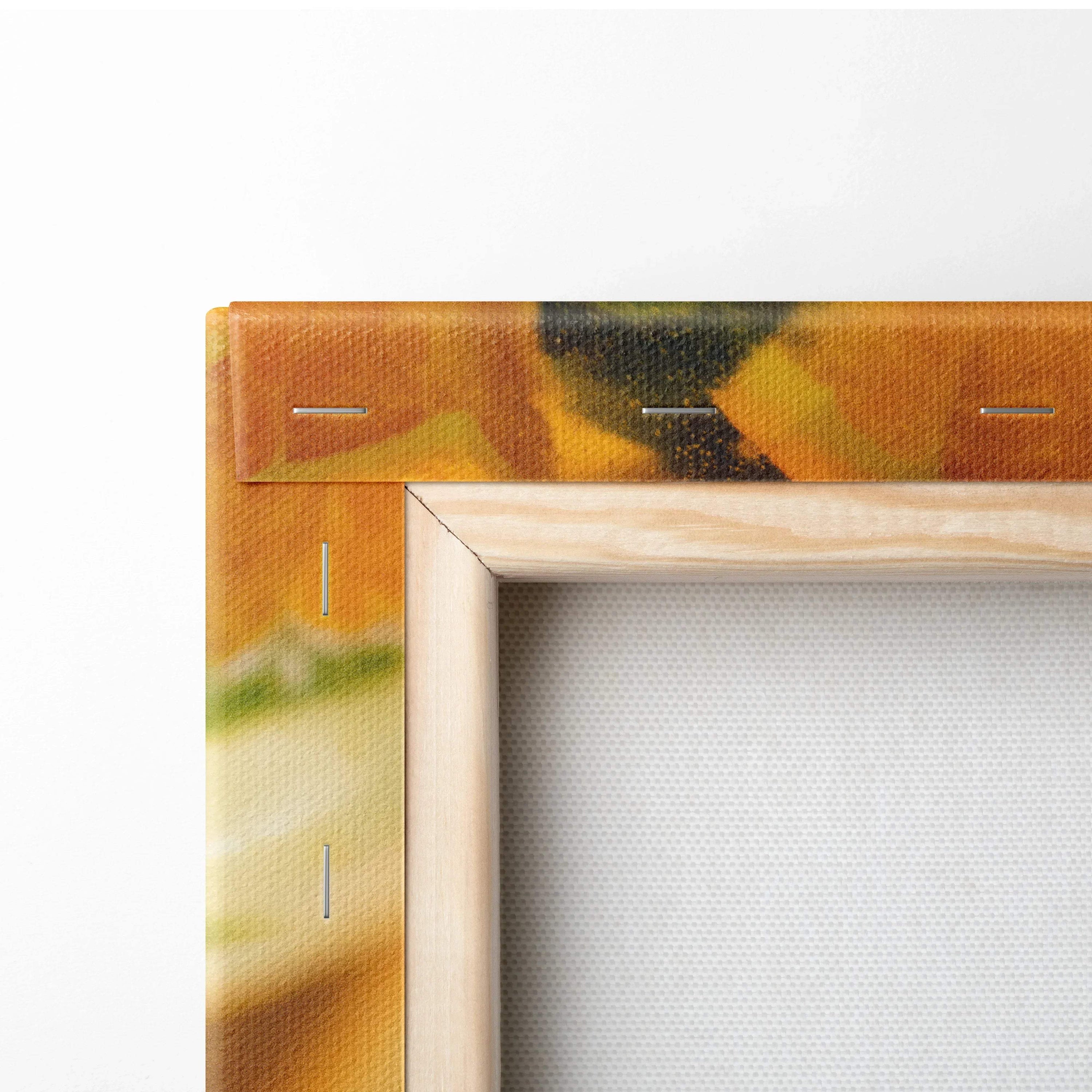 Close-up of vibrant orange slices canvas wall art with natural wood frame and staple details.