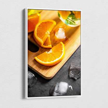 Vibrant orange slices on wooden board with ice cubes canvas wall art decor.