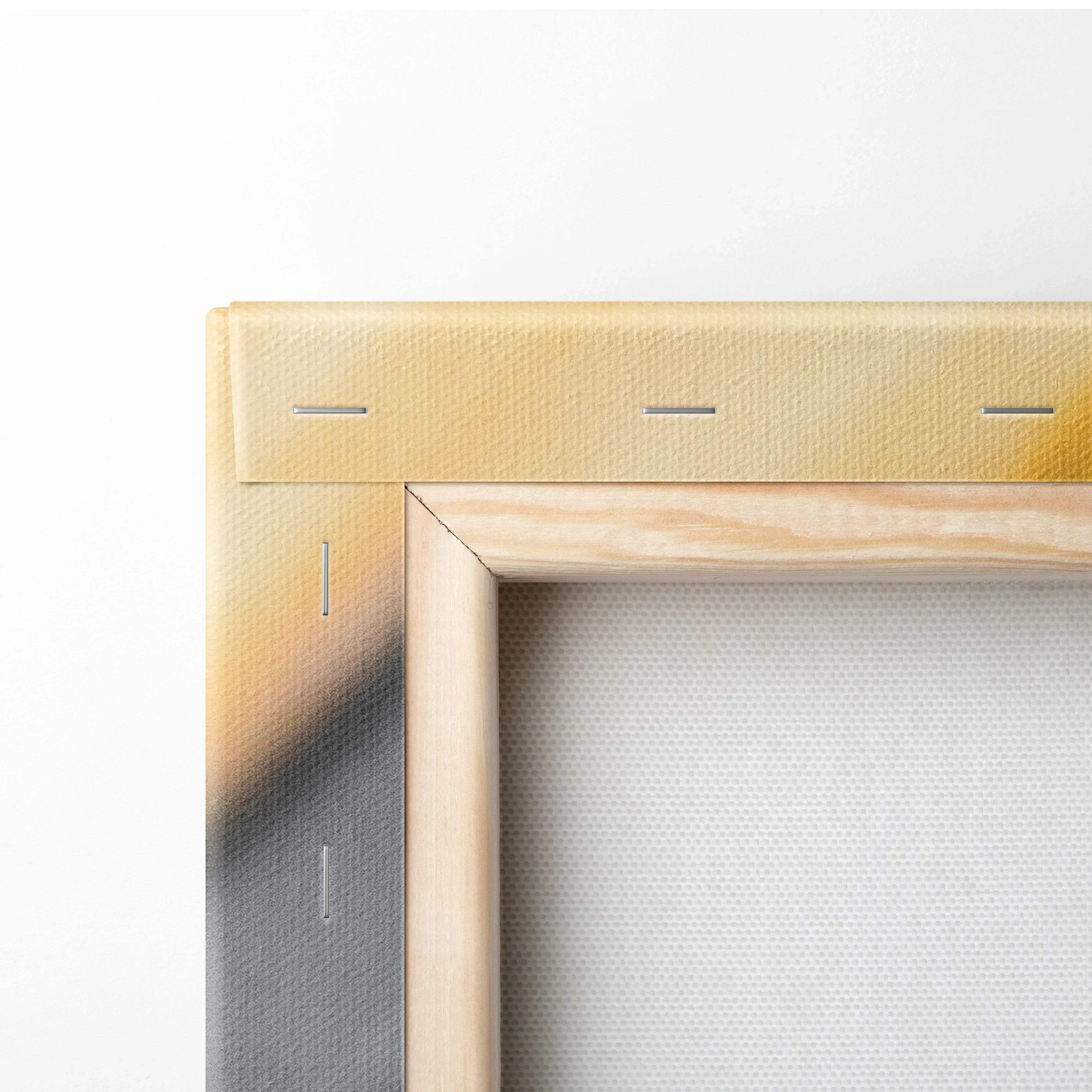 Close-up of wooden frame and canvas backing with visible staples on vibrant wall art decor.