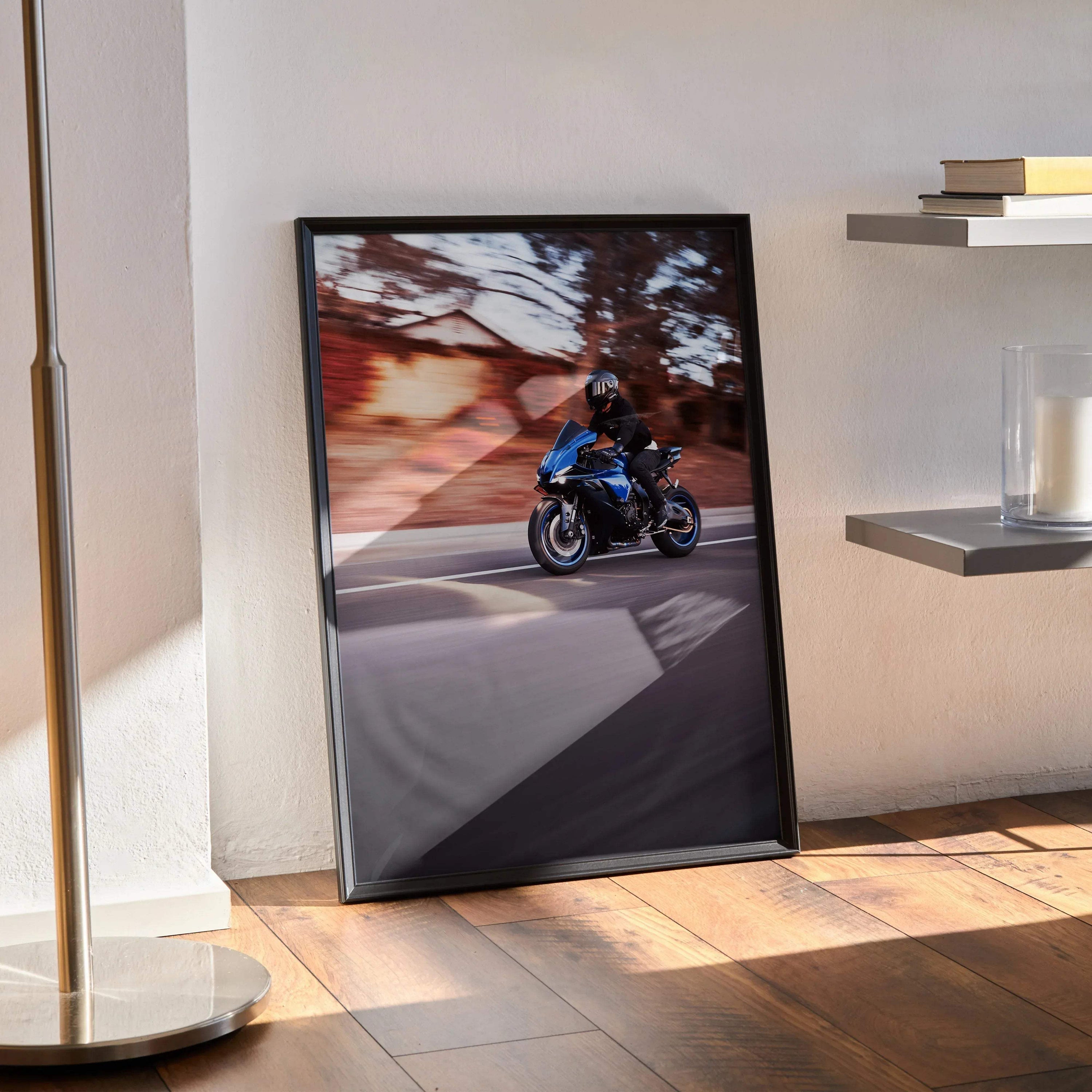 Yamaha R1 motorcycle poster leaning against wall, vibrant outdoor riding scene wall art.