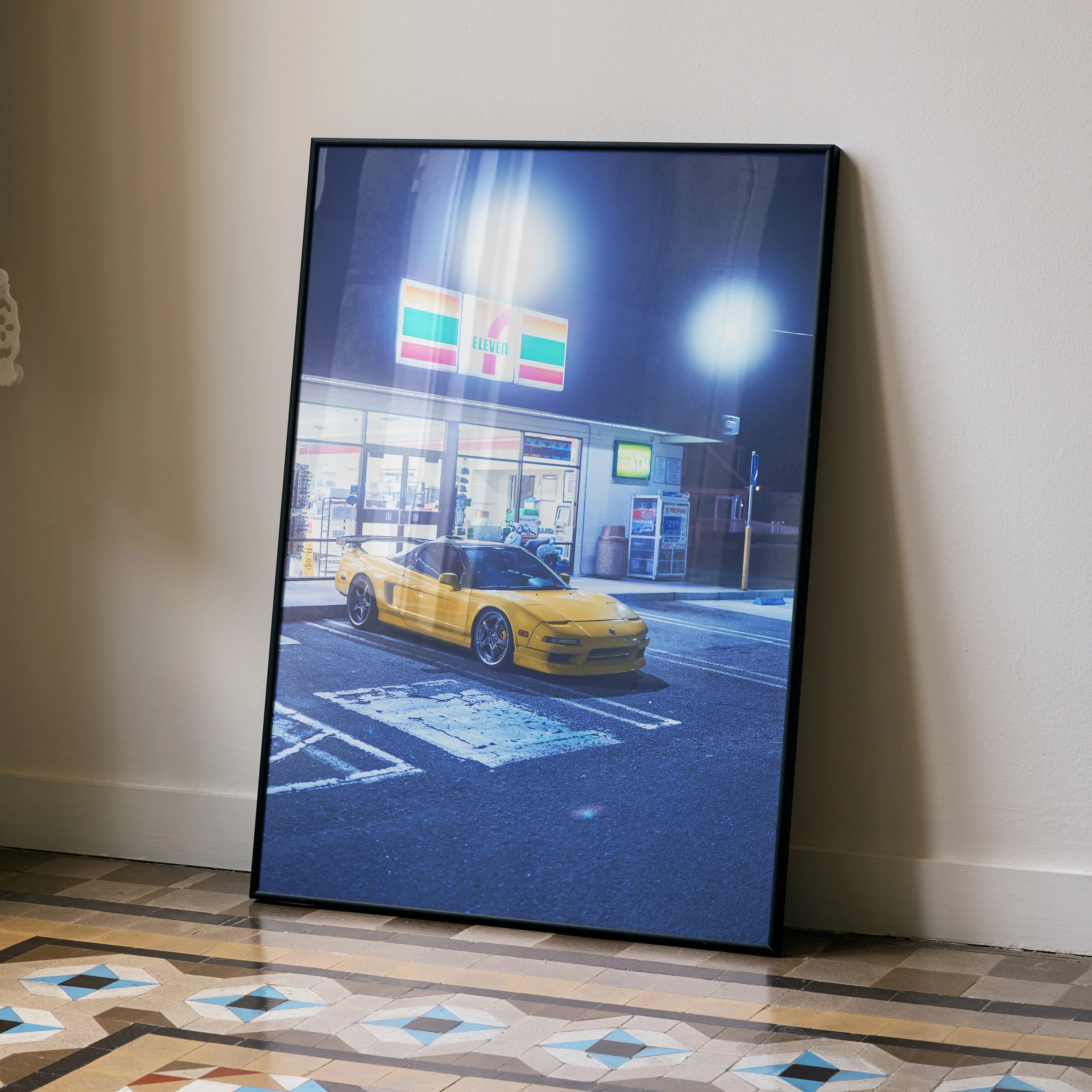 Yellow Acura NSX parked in front of a convenience store at night poster wall art.