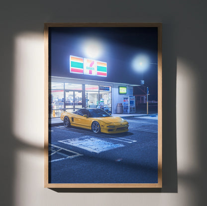 Acura NSX yellow sports car parked at night in front of illuminated 7-Eleven store poster wall art.
