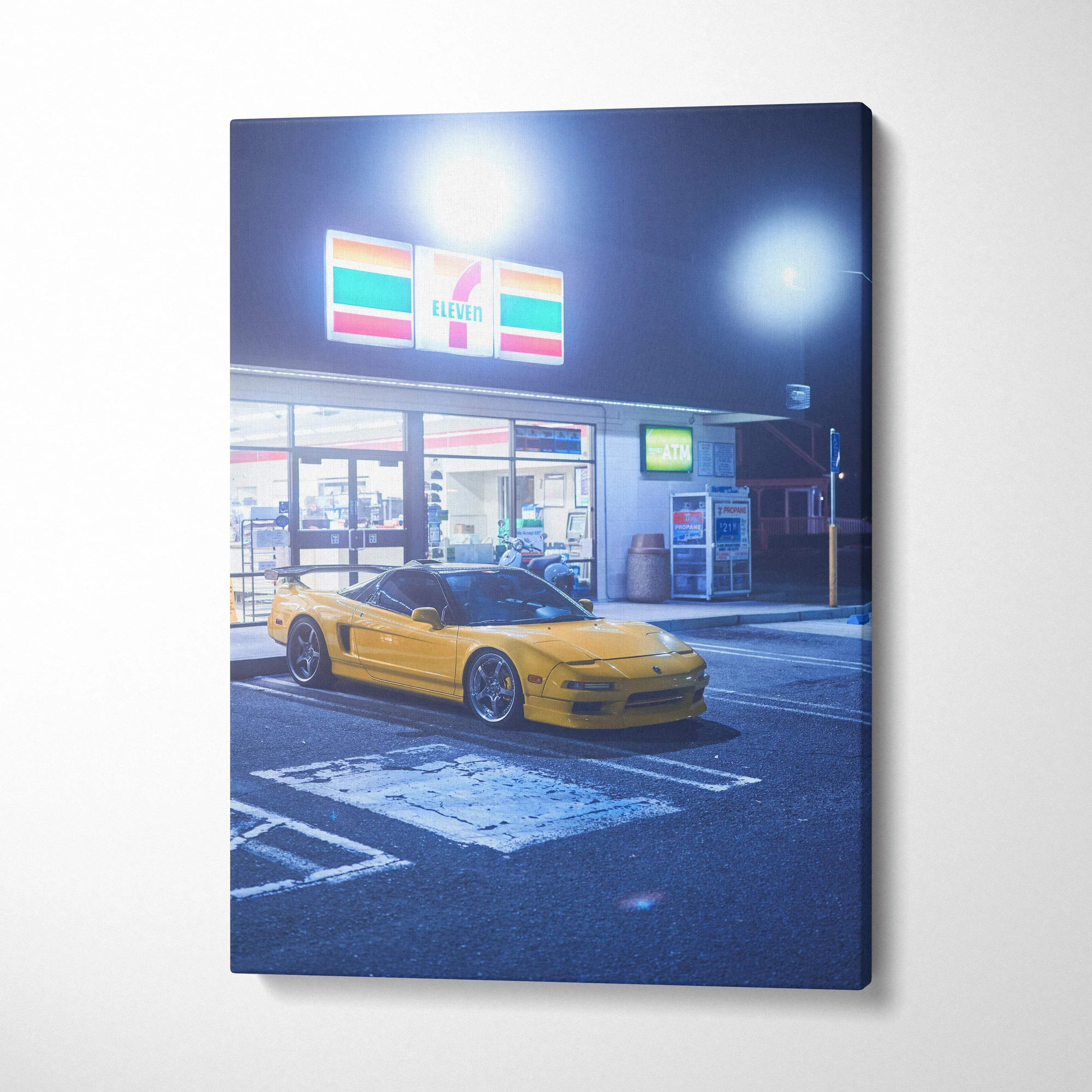Vertical canvas art featuring a bright yellow Acura NSX parked at a glowing 7-Eleven late at night, museum-quality wall art.