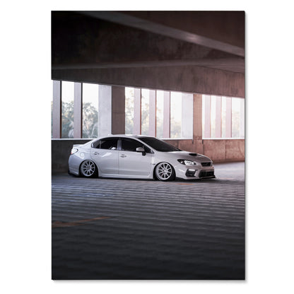 Subaru WRX white sports car parked under concrete ceiling in modern garage poster wall art.