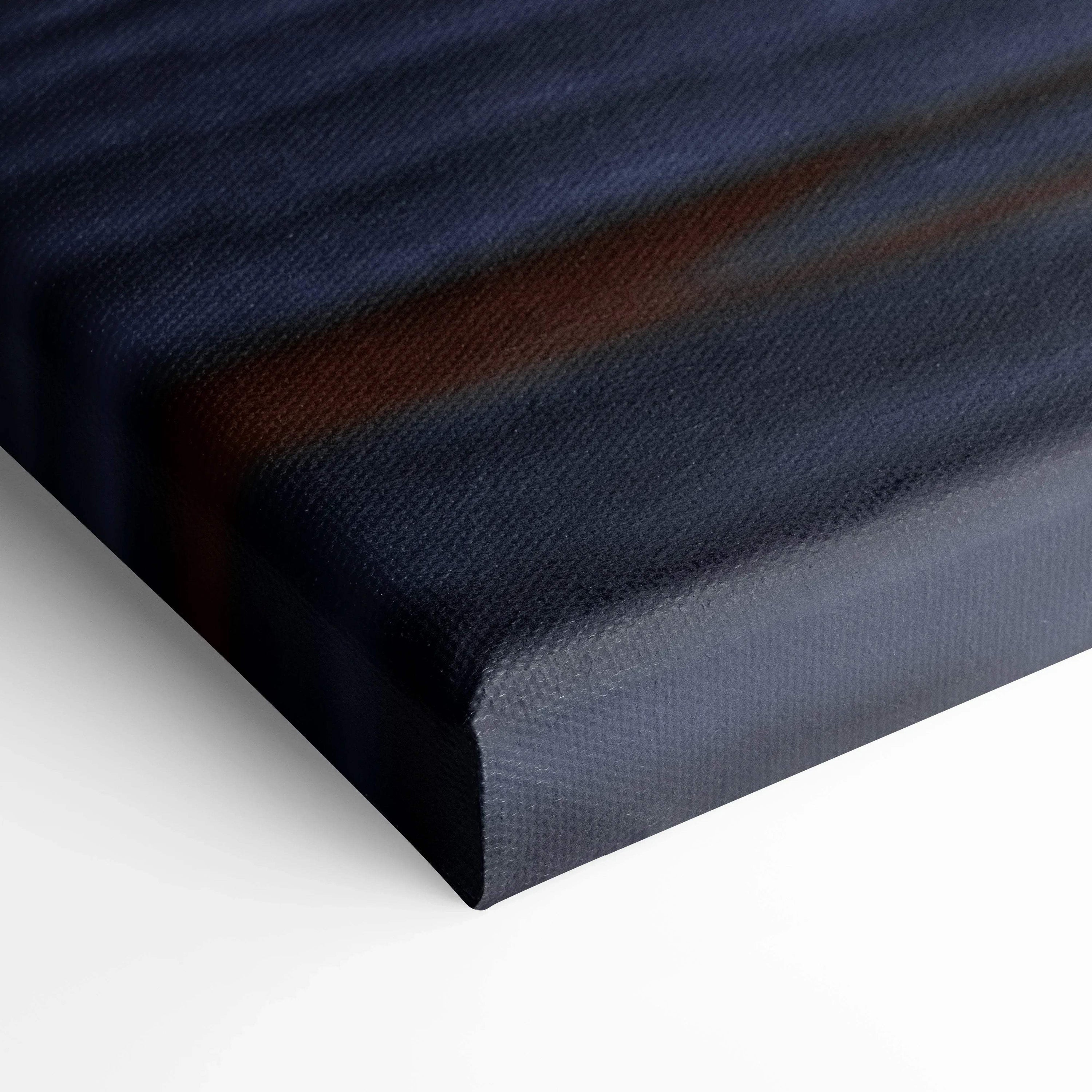 Close-up of textured canvas edge with dark blue and black tones, vertical canvas wall art detail.