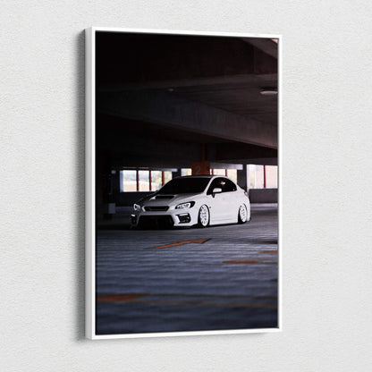 White Subaru WRX parked in dark garage on vertical canvas wall art print.