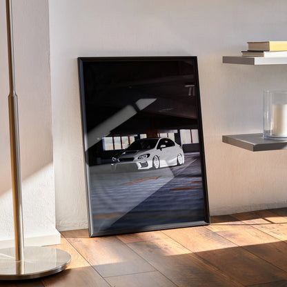 Subaru WRX poster in black frame leaning against wall, automotive wall art with dramatic lighting and shadows.