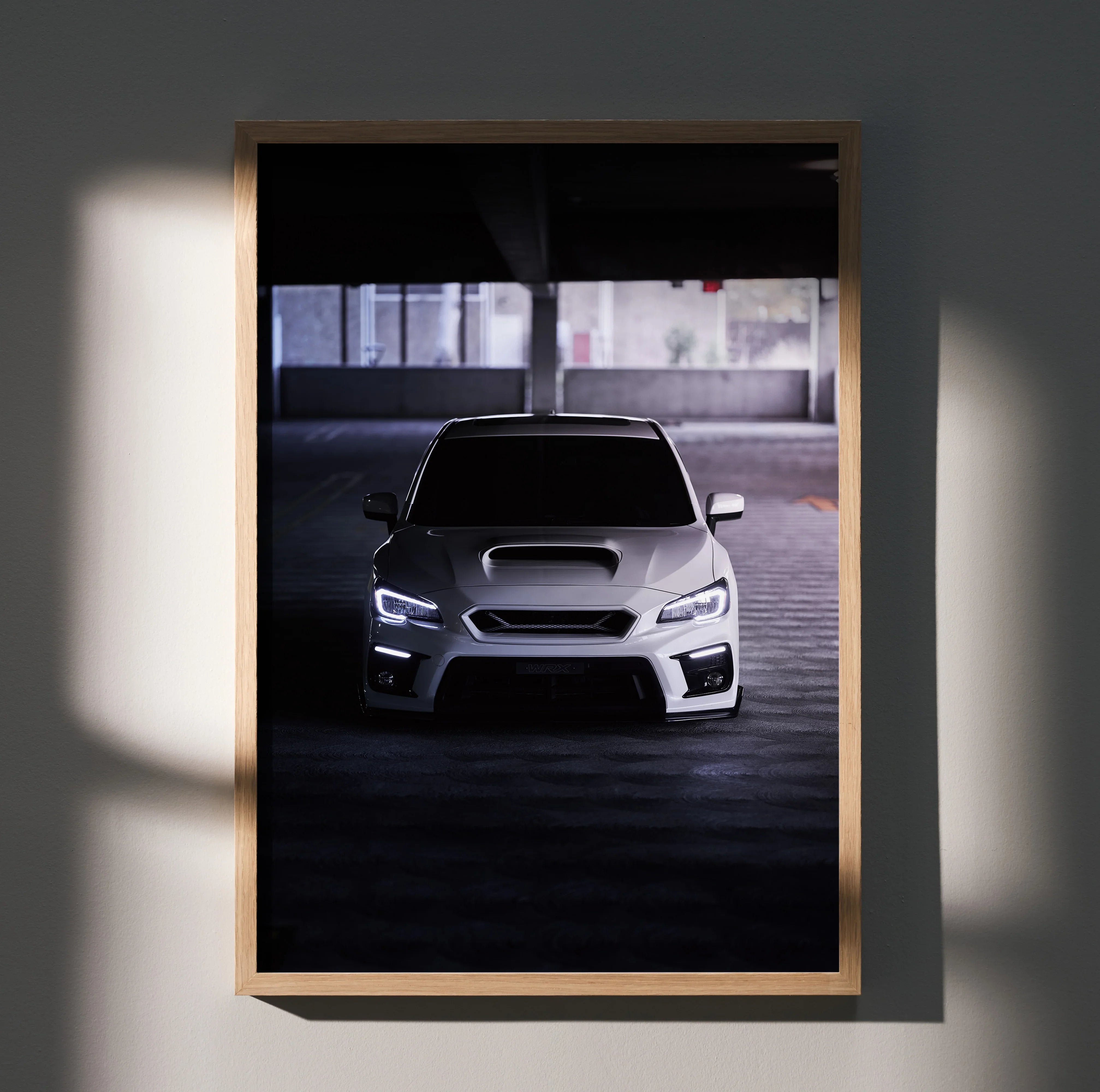 White Subaru WRX front view poster with dark moody lighting, high resolution wall art.