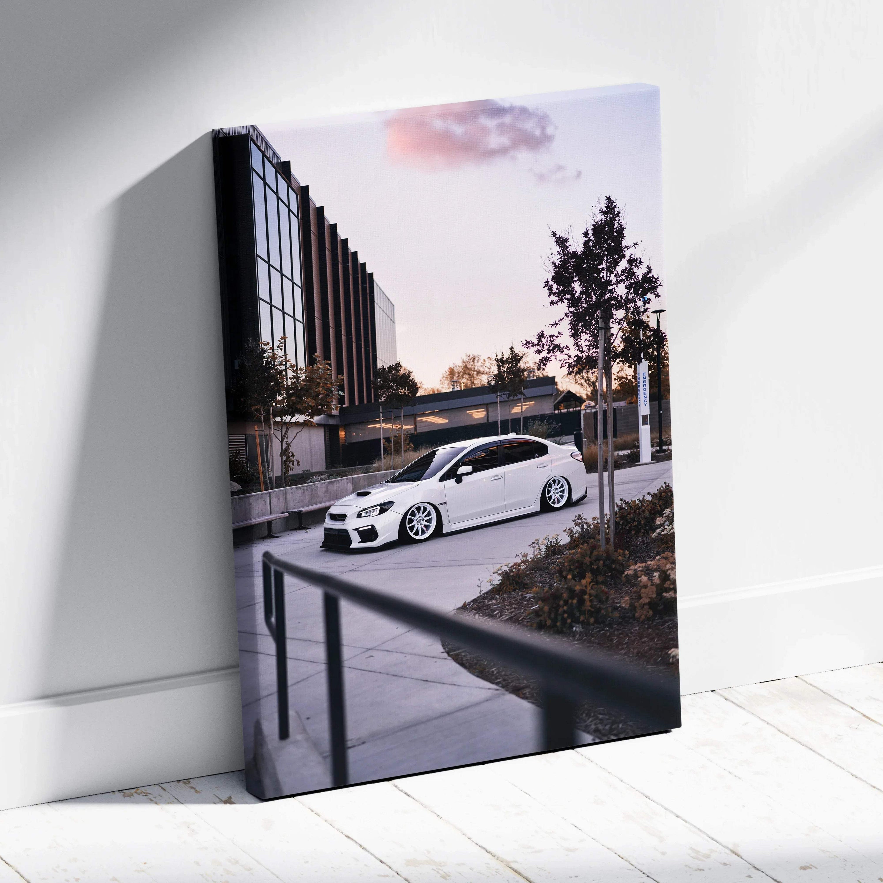 Subaru WRX white sports car parked outside modern building canvas wall art in vertical format.