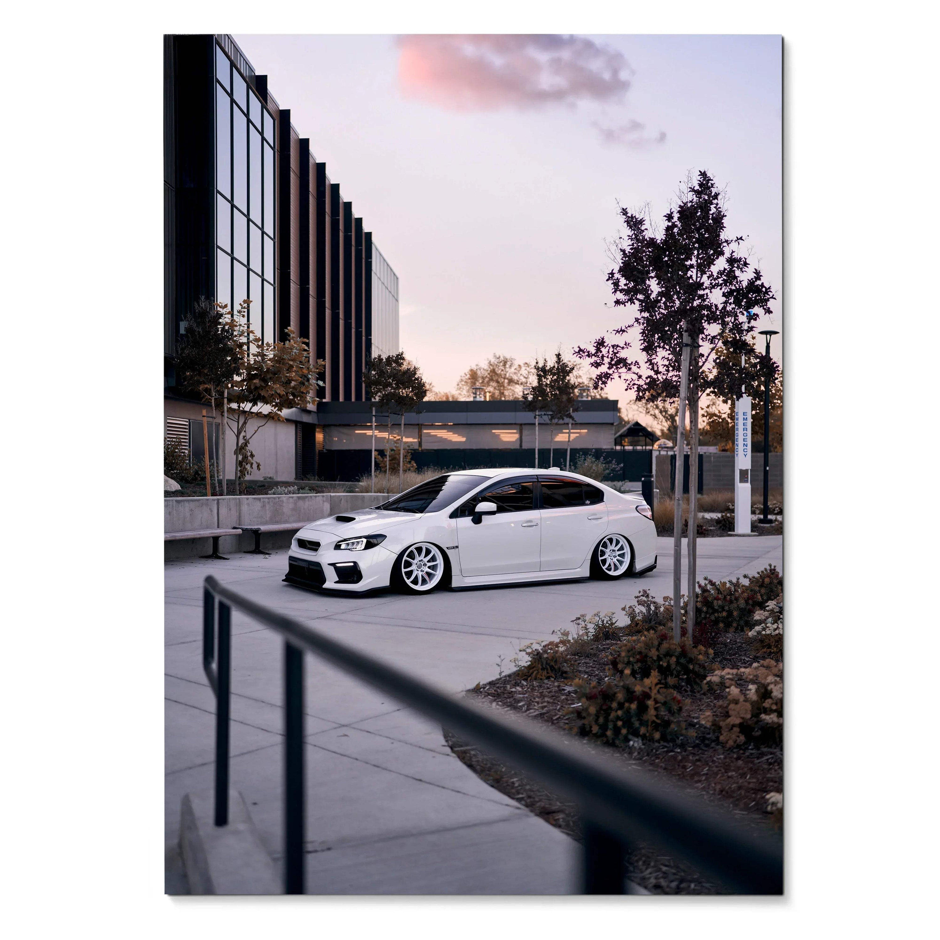 White Subaru WRX parked in urban setting at sunset, premium poster wall art design.