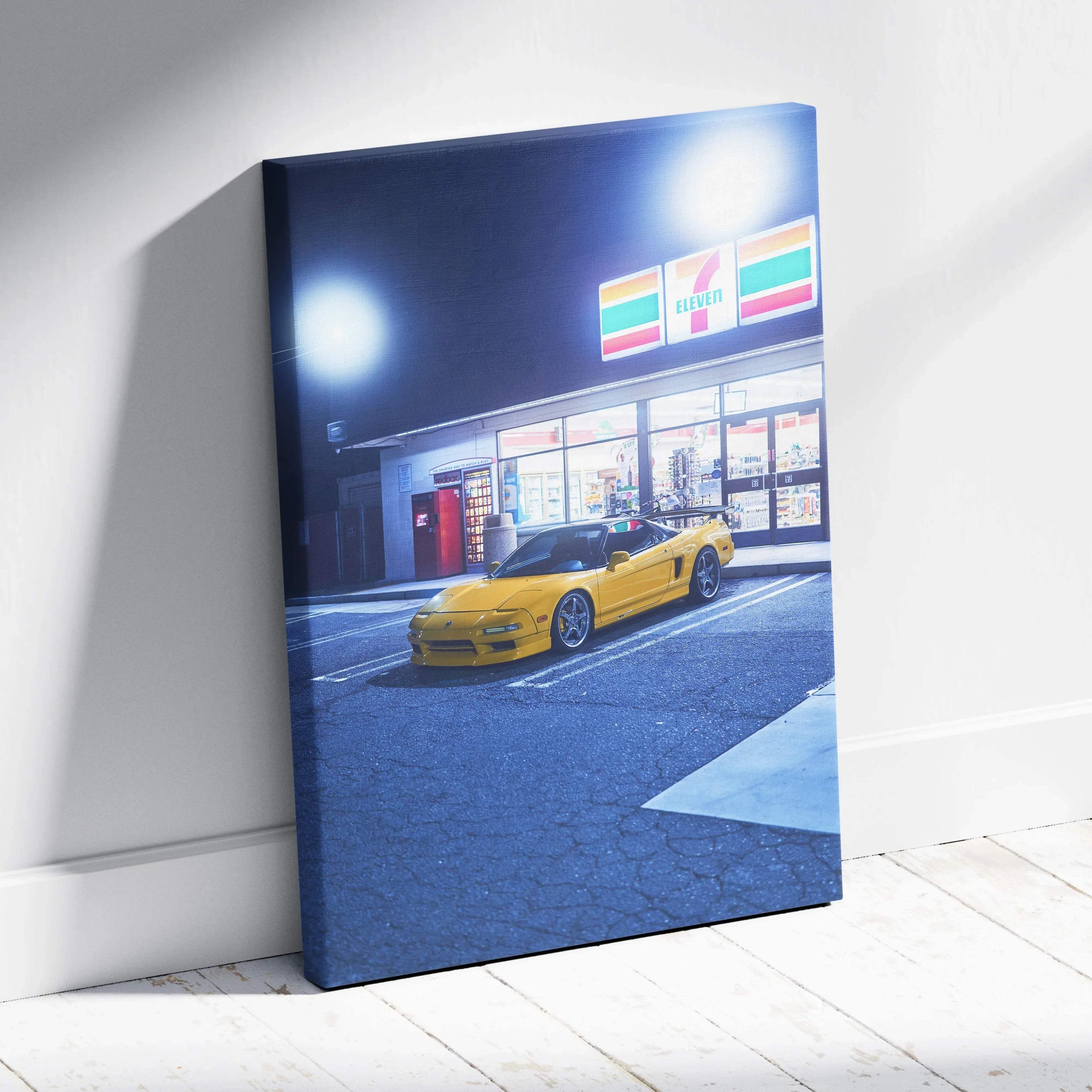 Vertical canvas art featuring a yellow Acura NSX parked outside a brightly lit 7-Eleven, modern wall art.