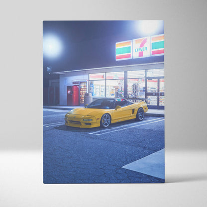 Yellow Acura NSX parked in front of illuminated 7-Eleven, vertical canvas wall art.