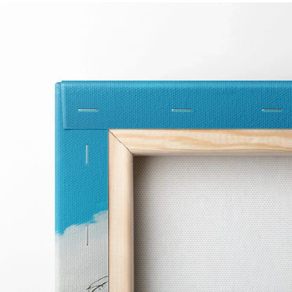 Close-up of canvas wall art with bright blue paint on fabric stretched over wooden frame, showing texture and staples.