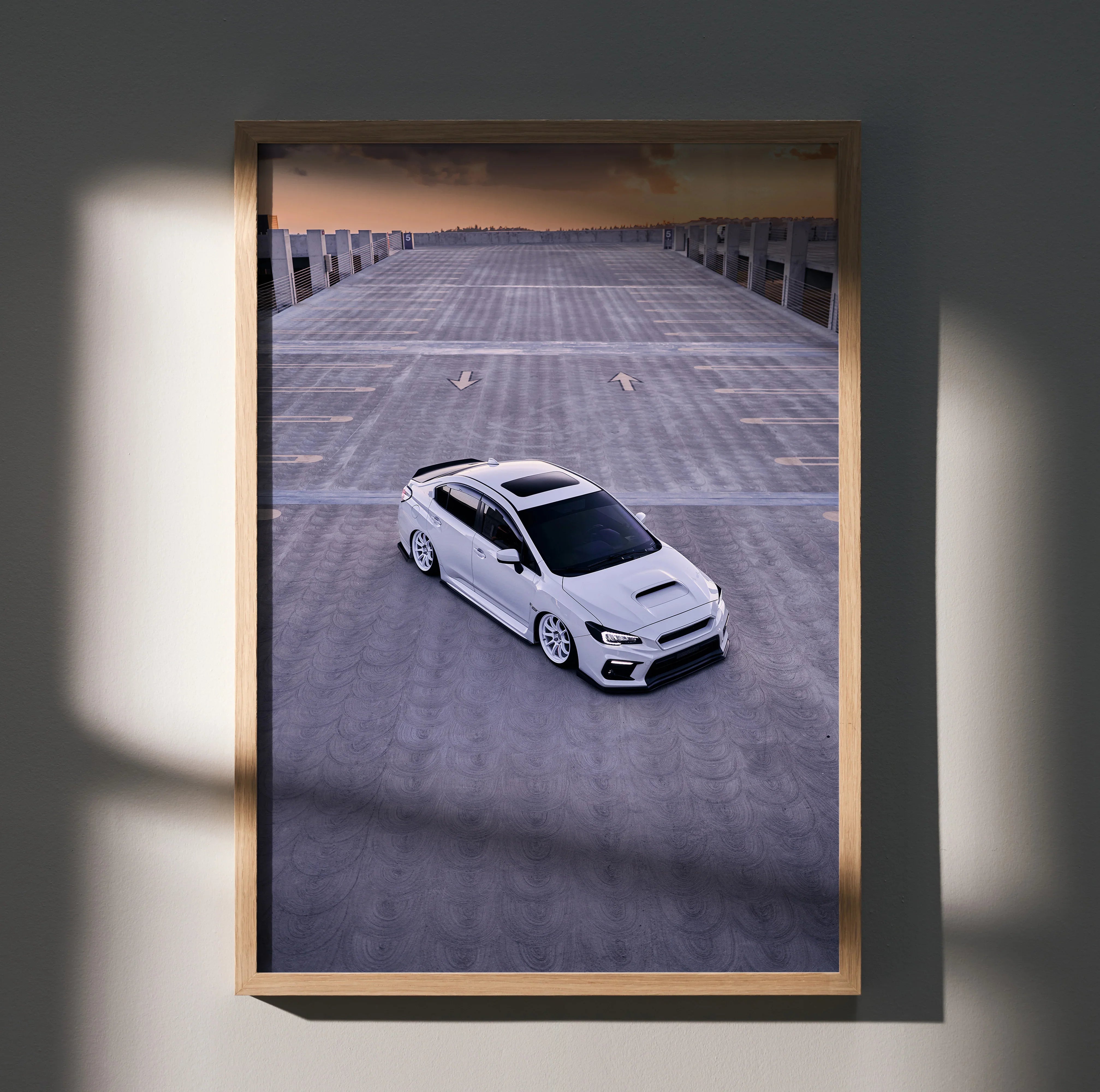Subaru WRX car poster wall art featuring a white WRX on rooftop parking lot in muted tones.