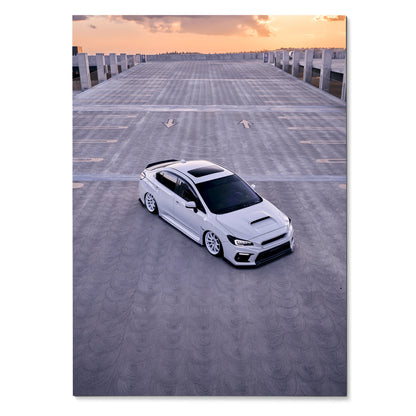 White Subaru WRX parked on rooftop at sunset automotive art poster wall art.