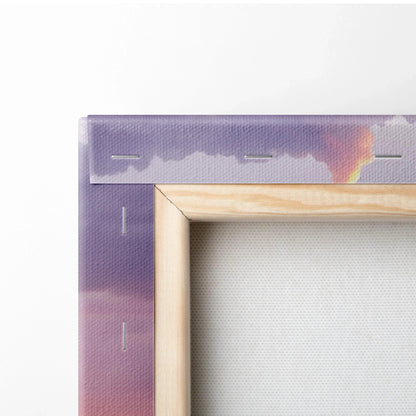 Close-up of stretched canvas showing wooden frame and sunset purple sky wall art edges.