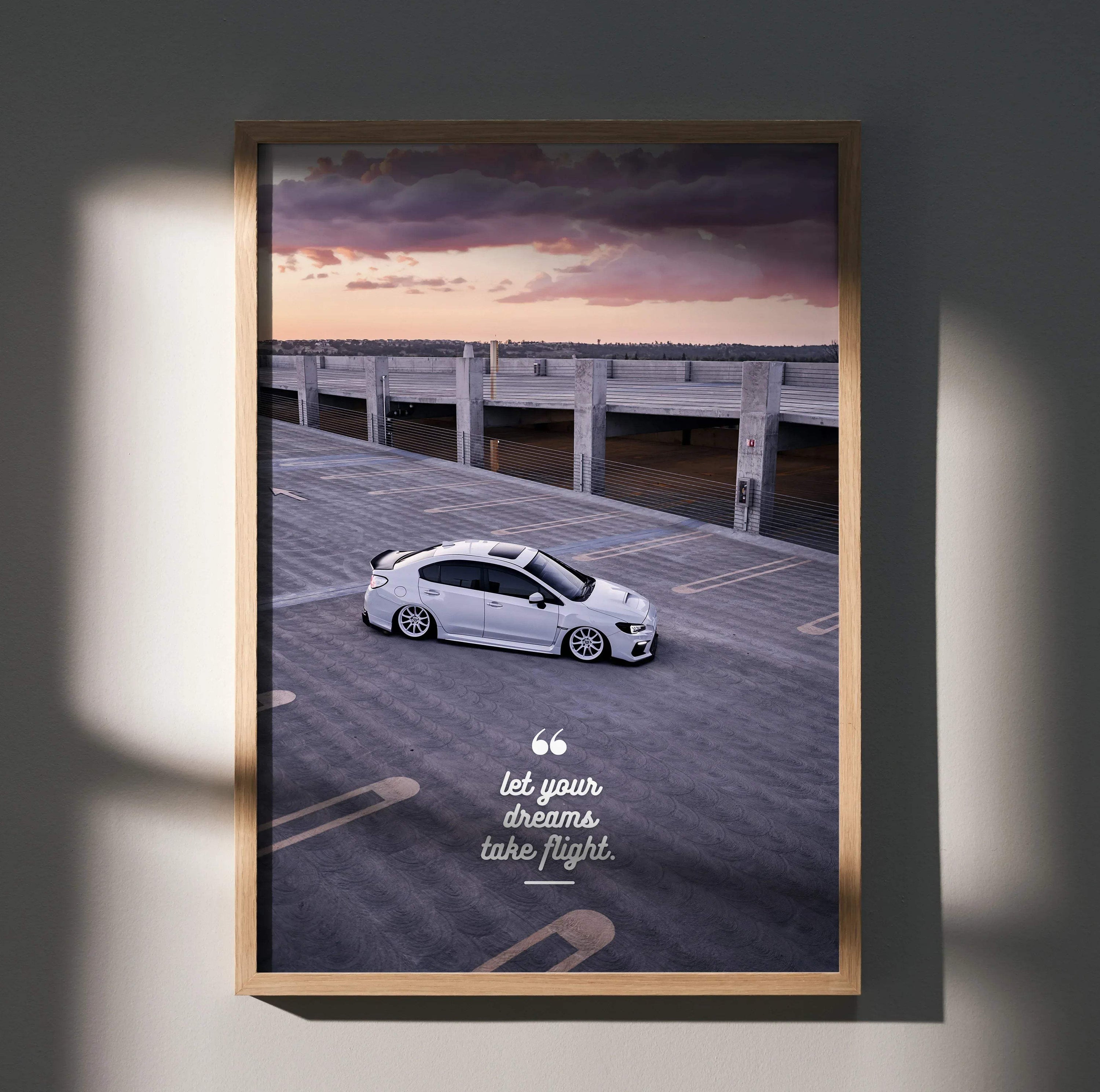 Motivational poster wall art featuring a white Subaru WRX on a wooden pier under a dramatic sky.