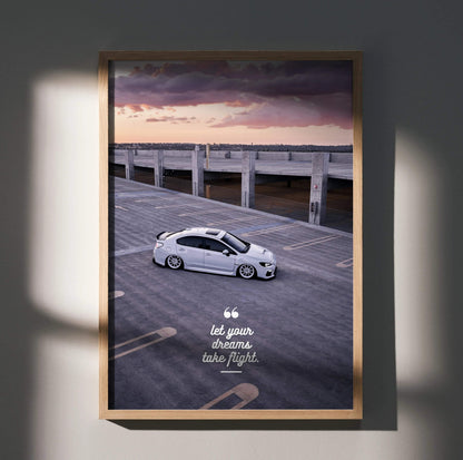 Motivational poster wall art featuring a white Subaru WRX on a wooden pier under a dramatic sky.