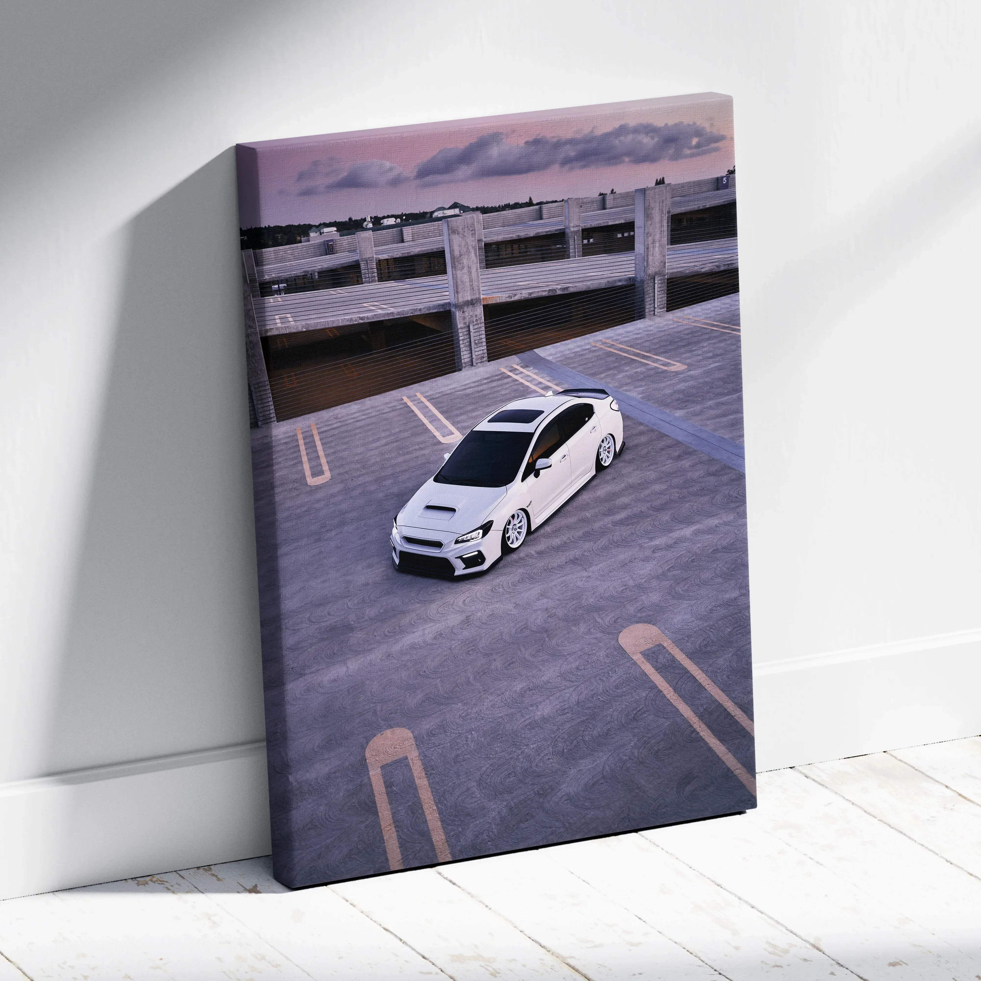 White subaru wrx sti canvas wall art featuring a high-angle shot in an empty parking lot sleek modern decor