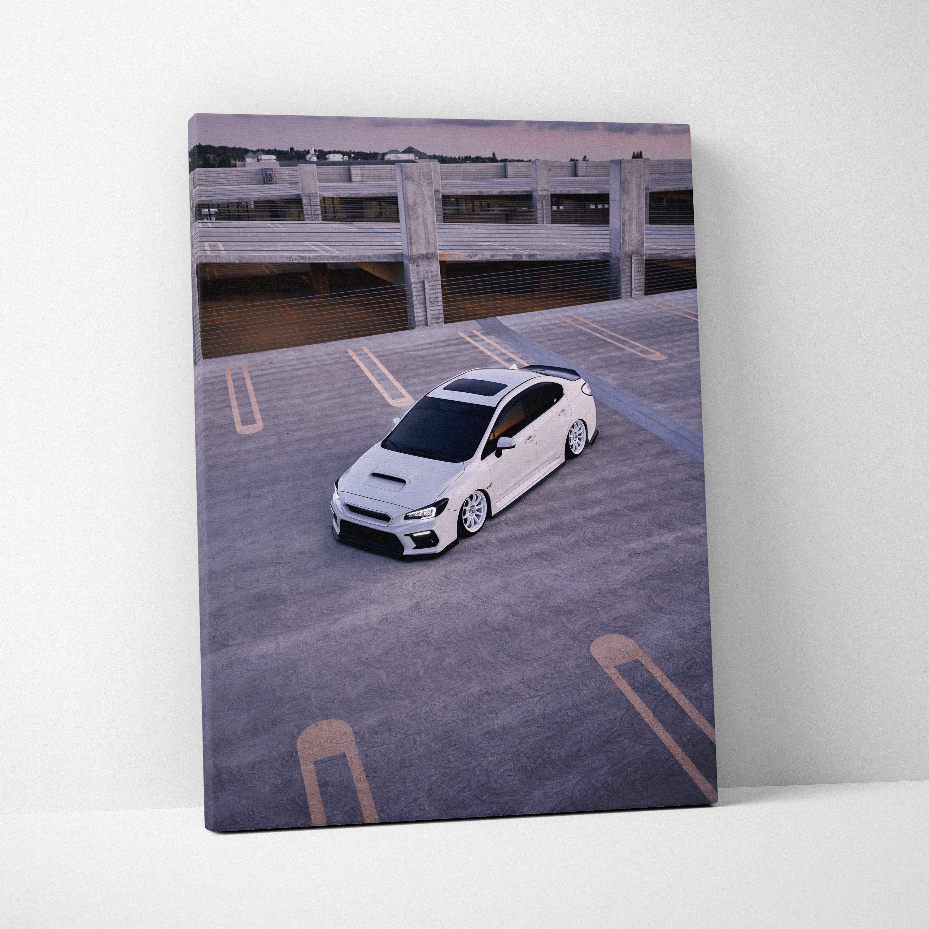 Subaru WRX car parked in empty rooftop lot canvas wall art, vertical canvas print.