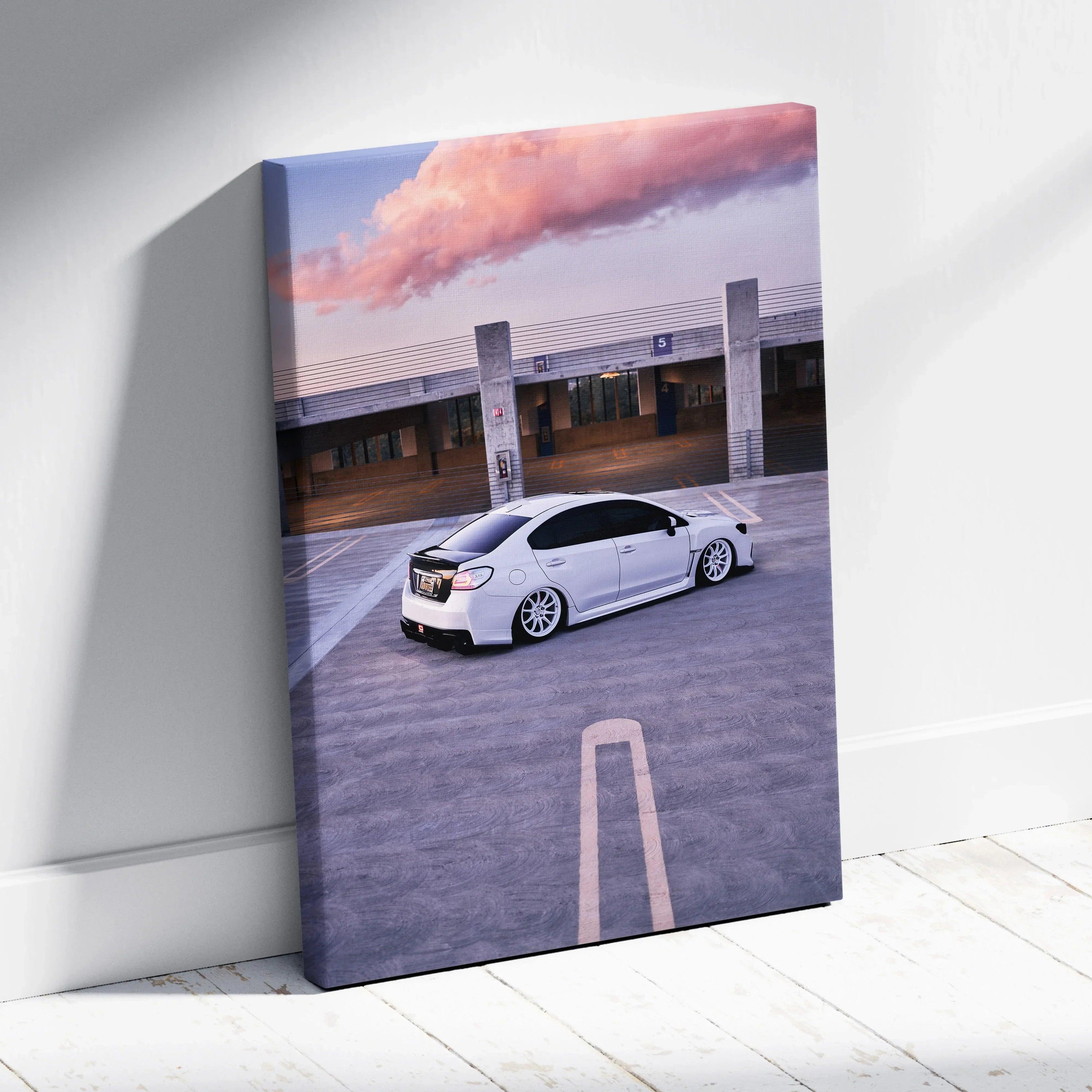 White Subaru WRX parked in an urban setting sunset scene canvas wall art.