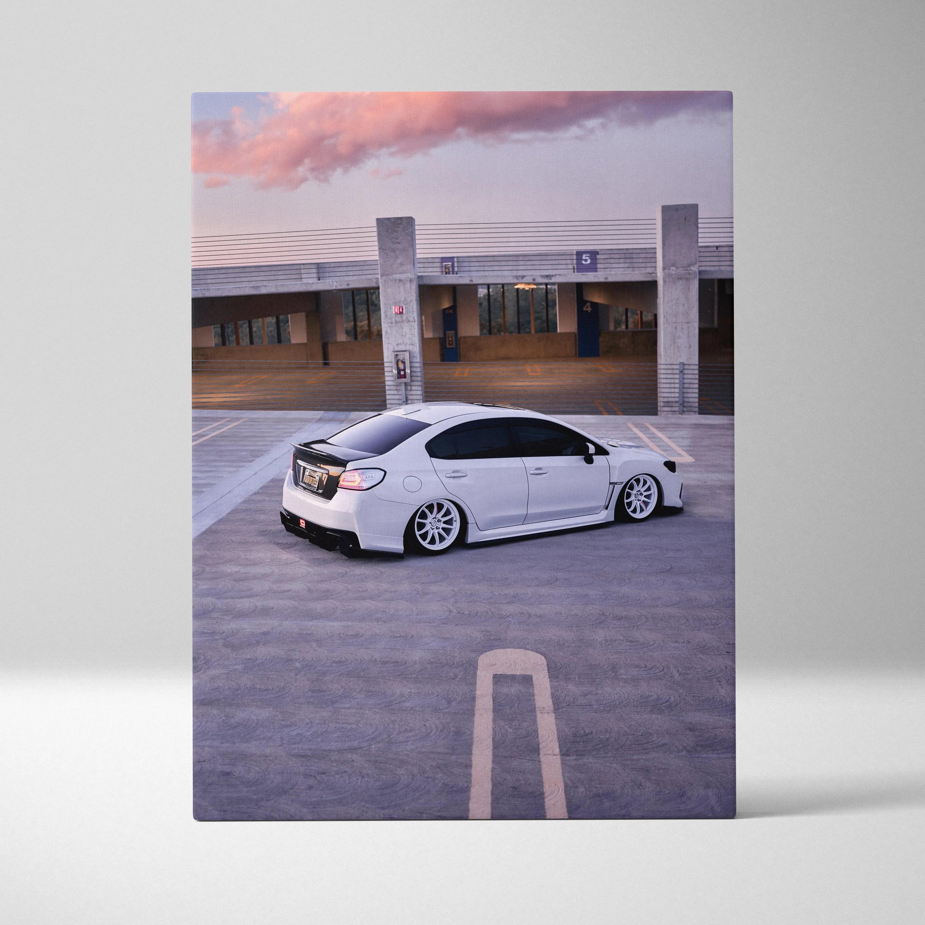 Subaru WRX white car parked in urban rooftop lot at sunset vertical canvas wall art.