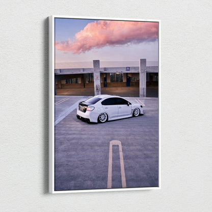 Subaru WRX white car parked in empty lot at sunset canvas wall art print.