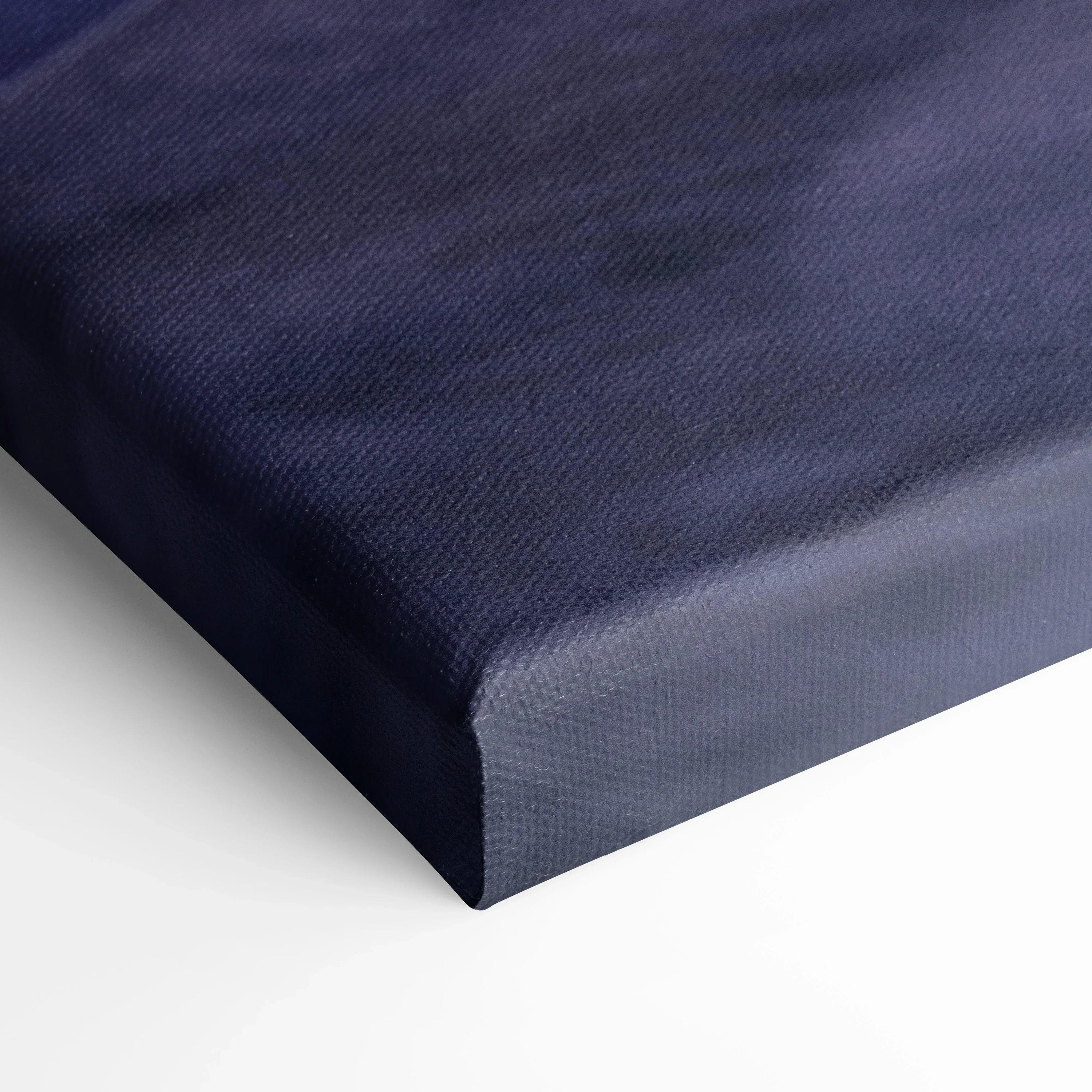 Close-up of a deep blue textured canvas corner showcasing premium wall art material and craftsmanship.